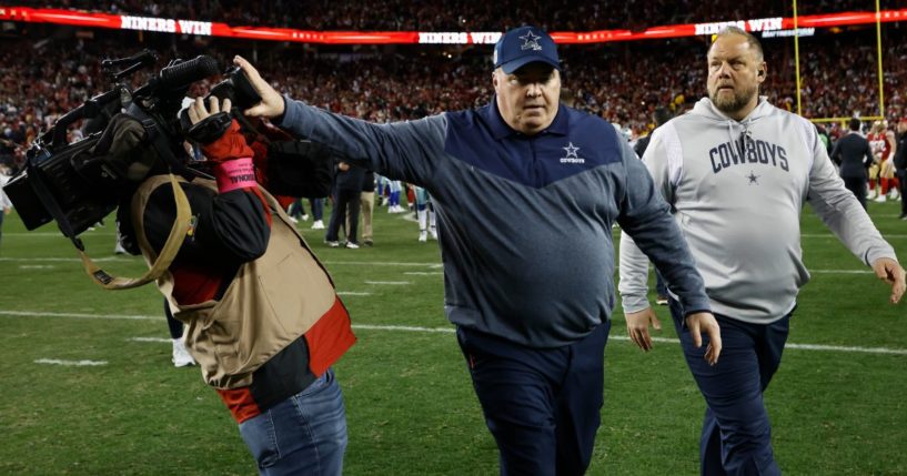 Dallas Cowboys head coach Mike McCarthy appears to push a cameraman away while walking off the field following his team's 19-12 loss to the San Francisco 49ers in Santa Clara, California, on Sunday.