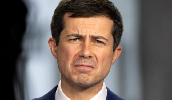 Transportation Secretary Pete Buttigieg does a television interview with CNBC outside the White House in Washington on Oct. 13, 2021.