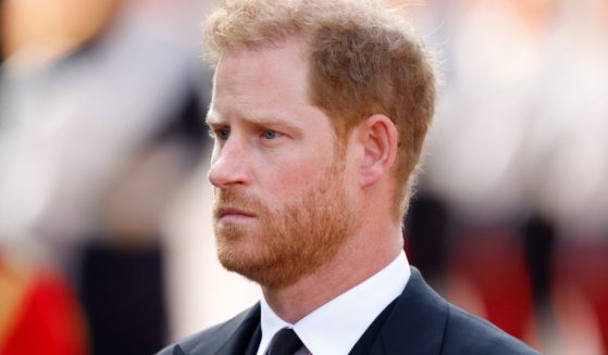 Prince Harry, Duke of Sussex, follows the coffin of Queen Elizabeth II as it is moved from Buckingham Palace to The Palace of Westminster on Sept. 14.