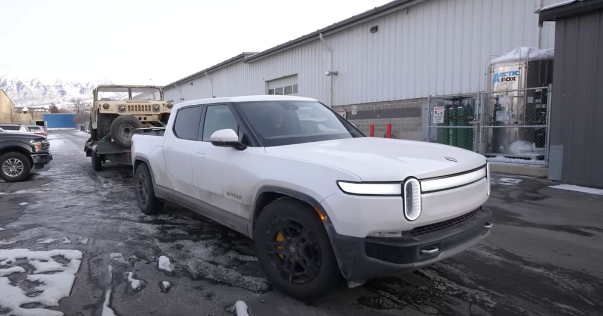 A YouTuber tows his electric Hummer with his electric Rivian.