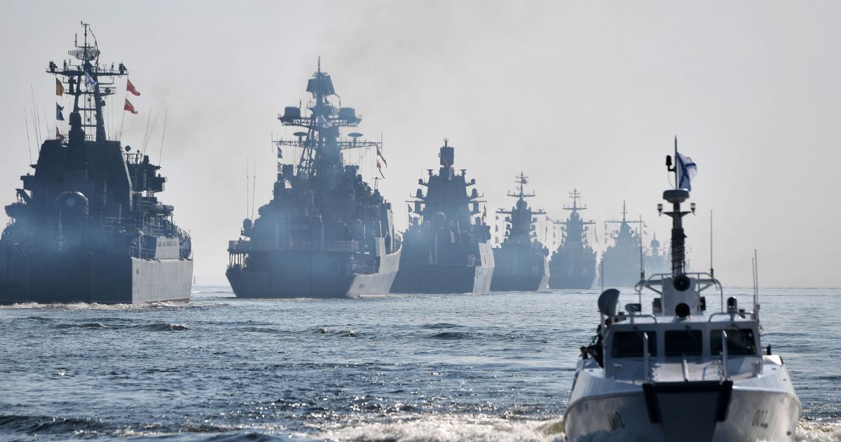 Russian warships sail during a parade of the Russian fleet as part of the Navy Day celebration, in Saint Petersburg, Russia. on July 28, 2019.