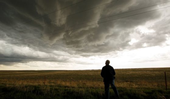 Tim Marshall monitors a supercell thunderstorm near Agate, Colorado, on May 8, 2017.