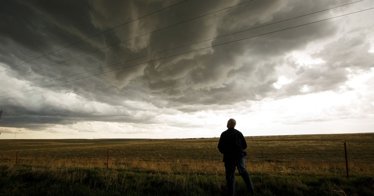 Tim Marshall monitors a supercell thunderstorm near Agate, Colorado, on May 8, 2017.