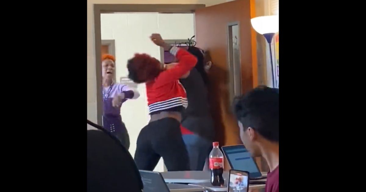 A student attacks a teacher at Heritage High School in Conyers, Georgia.