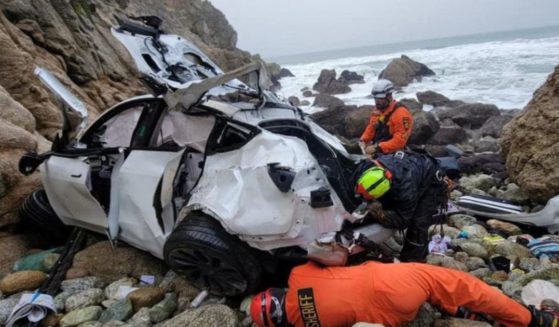 After a family of 4 survived a 250-foot crash in their Tesla, the father Dharmesh Patel, is now suspected of intentionally causing the crash.