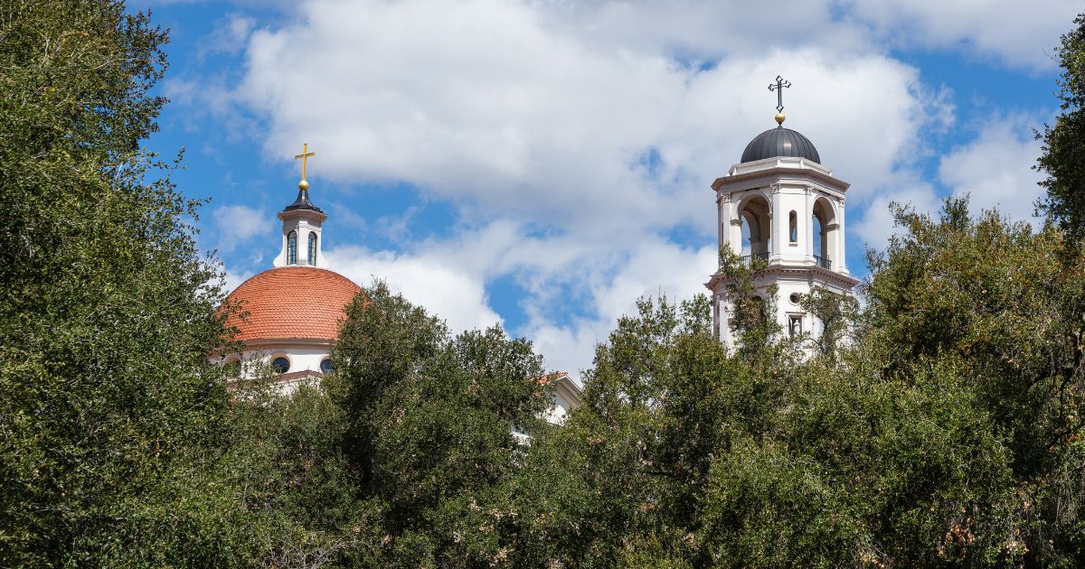 The church dome and campanile on the campus of Thomas Aquinas College in Santa Paula, California, are seen on March 21, 2021.