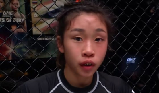 Victoria Lee celebrates after winning her first ONE MMA fight against Sunisa Srisan in February 2021.