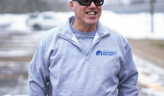 Thomas Rhodes smiles as he walks out of a Minnesota state prison in Moose Lake, Minnesota, on Friday.