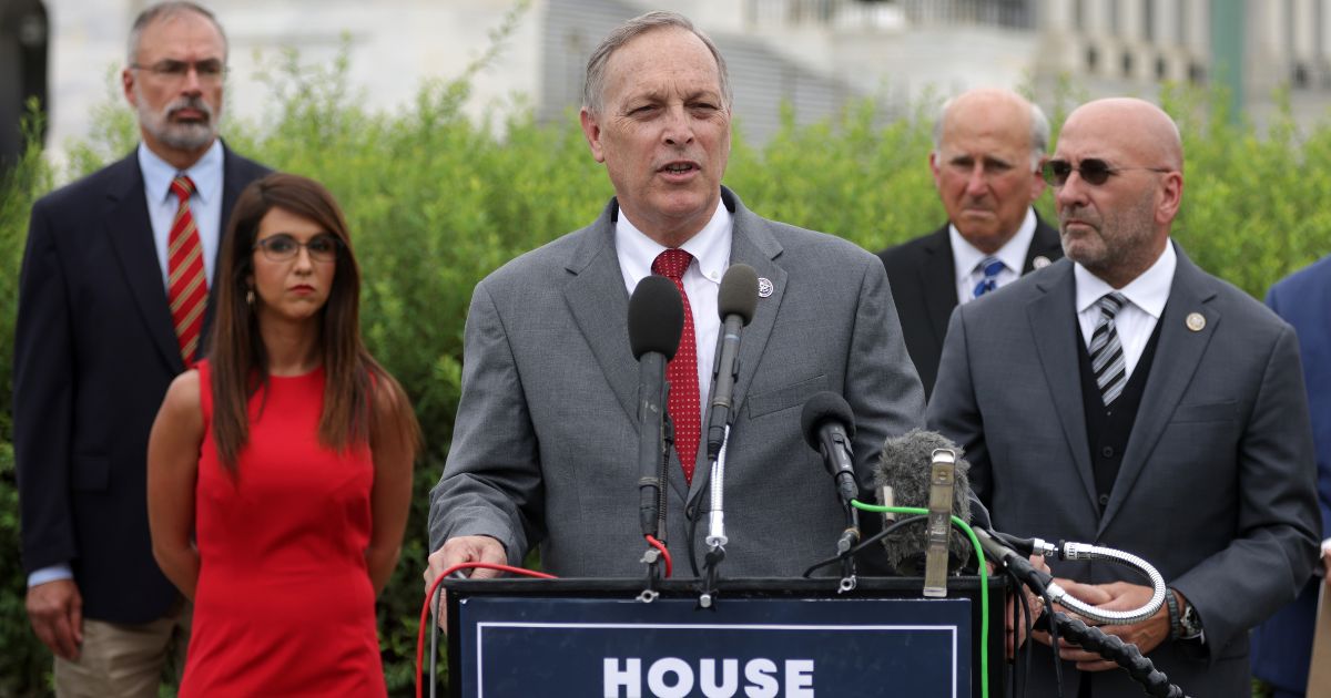 Chair of the Freedom Caucus U.S. Andy Biggs speaks as caucus members listen during a news conference in front of the U.S. Capitol Aug. 31, 2021, in Washington, D.C.