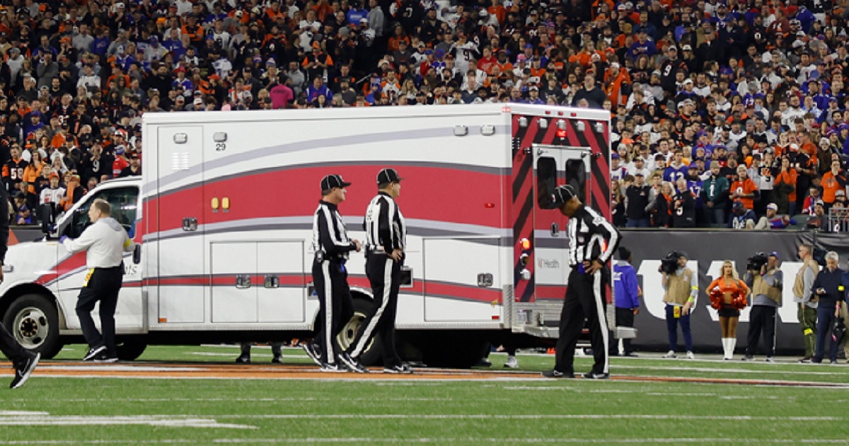 The ambulance carrying Buffalo Bills safety Damar Hamlin leaves the field Monday after Hamlin's collapse during a "Monday Night Football" game at Paycor Stadium in Cincinnati.
