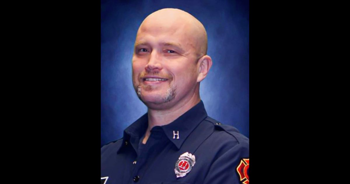 This screen shot shows firefighter Chad Cate.