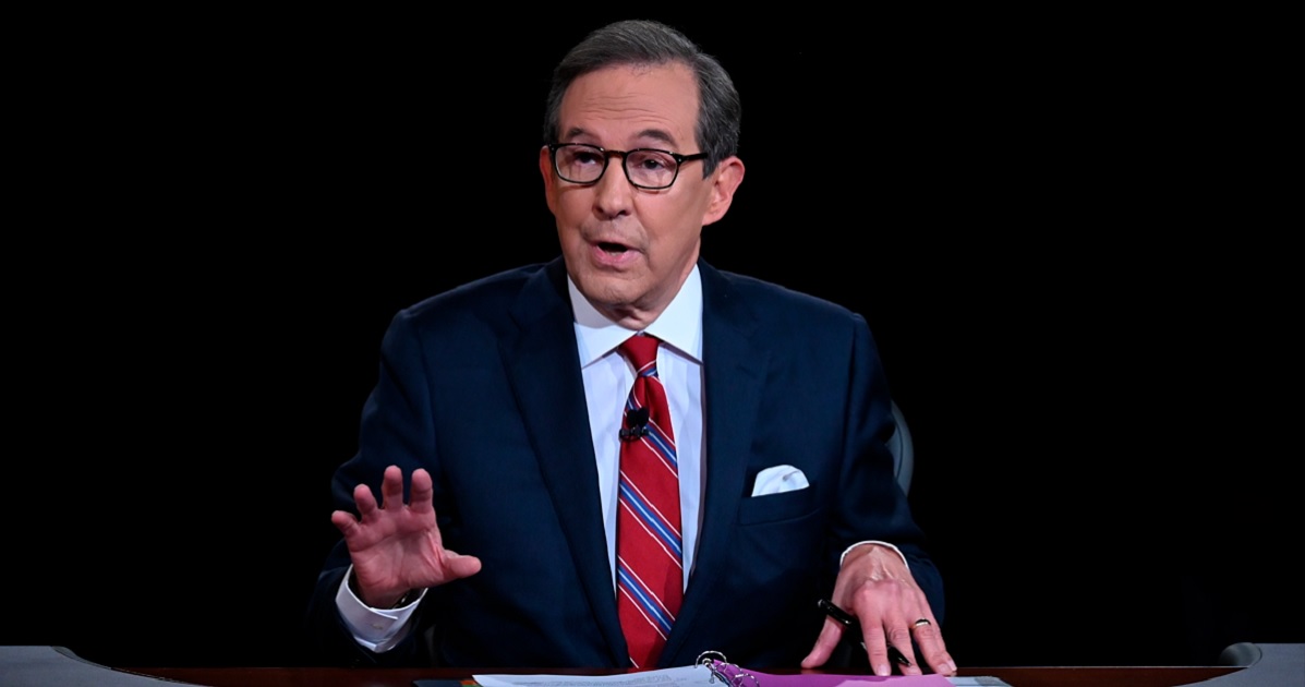 Former Fox News personality Chris Wallace is pictured in a September 2020 file photo from the first presidential debate between then-President Donald Trump and Democrat Joe Biden.