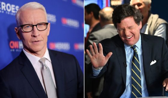 On the left, Anderson Cooper attends the 16th annual CNN Heroes: An All-Star Tribute at the American Museum of Natural History on Dec. 11, 2022, in New York City. On the right, Tucker Carlson onstage during the 2022 FOX Nation Patriot Awards at Hard Rock Live at Seminole Hard Rock Hotel & Casino Hollywood on Nov. 17, 2022, in Hollywood, Florida.