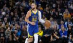 Stephen Curry of the Golden State Warriors dribbles the ball up the court against the Toronto Raptors during the fourth quarter of an NBA basketball game in San Francisco on Friday.
