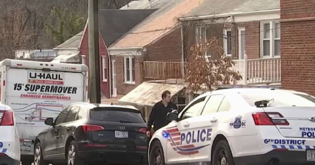 Police investigate a neighborhood believed to be linked to the shooting of a 4-year-old girl Saturday in Washington, D.C.