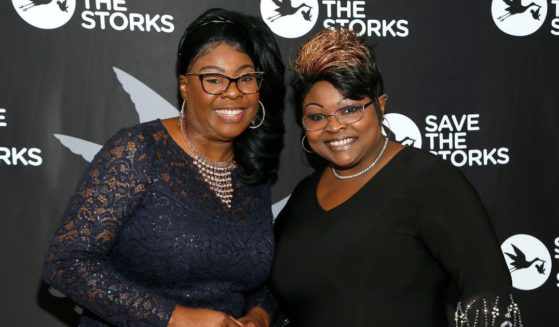 Diamond, left, and Silk attend an event at the Trump International Hotel in Washington on Jan. 17, 2019.