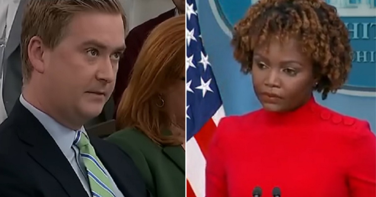 Fox News correspondent Peter Doocy, left, asks White House press secretary Karine Jean-Pierre, right, a question.