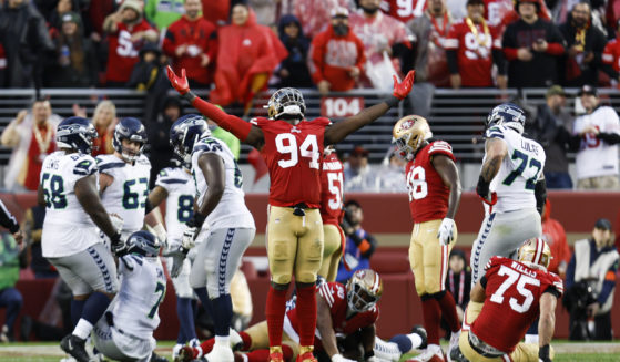 San Francisco 49ers defensive end Charles Omenihu, number 94, celebrates during the NFL wild card playoff game against the Seattle Seahawks in Santa Clara, California, on Jan. 14.