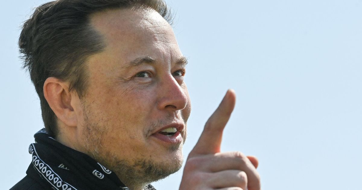 U.S. entrepreneur and business magnate Elon Musk gestures during a visit at the Tesla Gigafactory plant under construction, on Aug. 13, 2021, in Gruenheide near Berlin, eastern Germany.