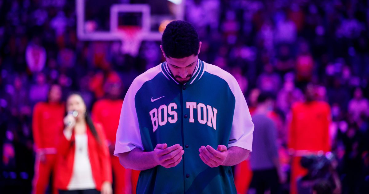 Enes Kanter #13 of the Boston Celtics during the national anthem prior to the first half against the Toronto Raptors at Scotiabank Arena on November 28, 2021 in Toronto, Canada.