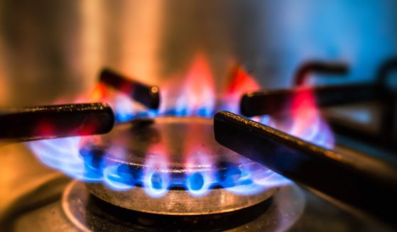 This stock image shows a zoomed-in view of a gas stove.