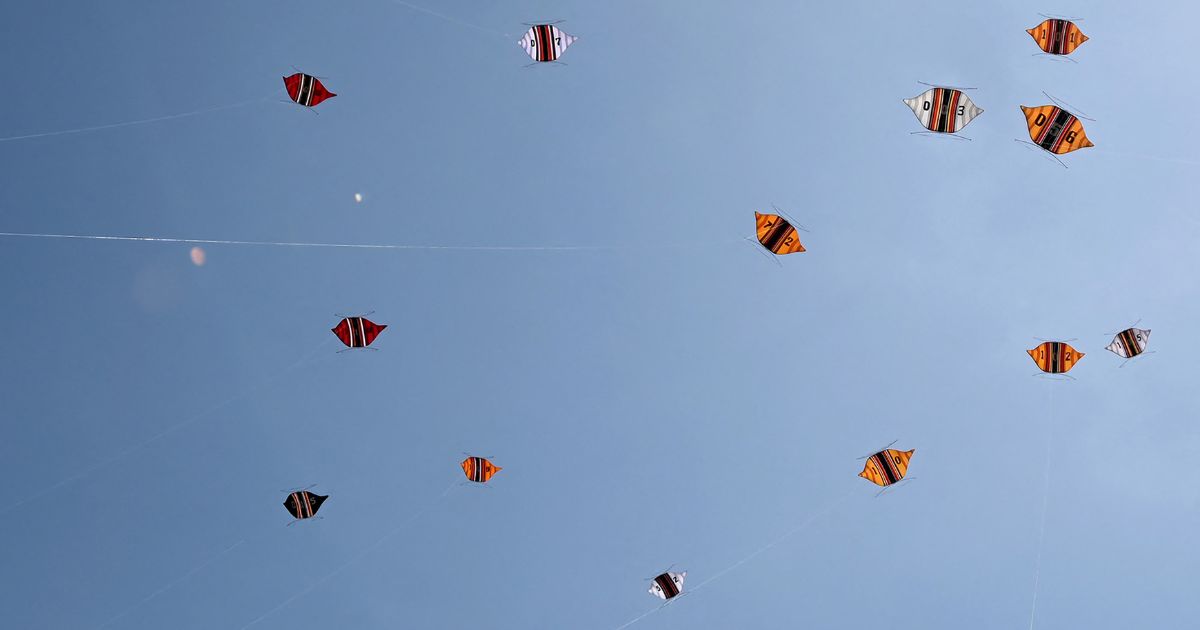 Kites are seen during the Kite Festival at Mertasari beach in Sanur on the Indonesian resort island of Bali on July 31, 2022.