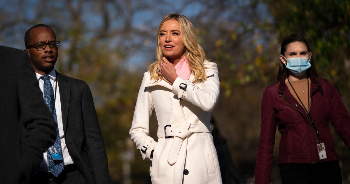 Former White House press secretary Kayleigh McEnany walks back to the West Wing after doing a television interview with One America News Network outside of the White House on November 18, 2020 in Washington, DC.