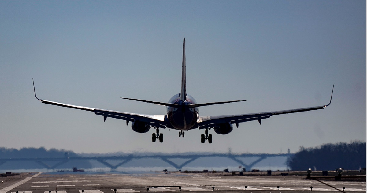 A passenger plane lands at Ronald Reagan Washington National Airport in Arlington, Virginia, in December.