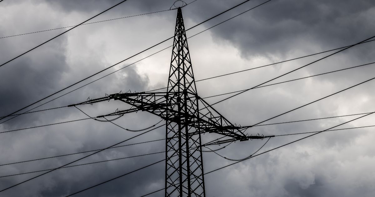 A transmission tower is seen in the above stock image.