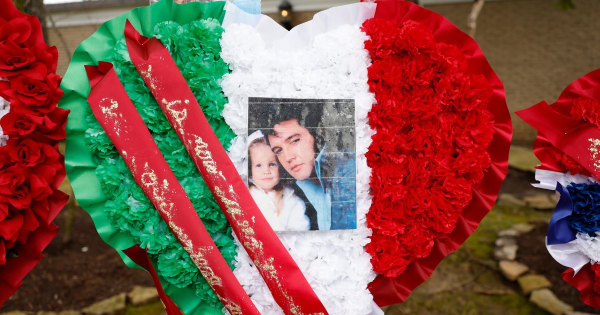 A view of fan tributes outside of Graceland at the public memorial for Lisa Marie Presley on Sunday in Memphis.