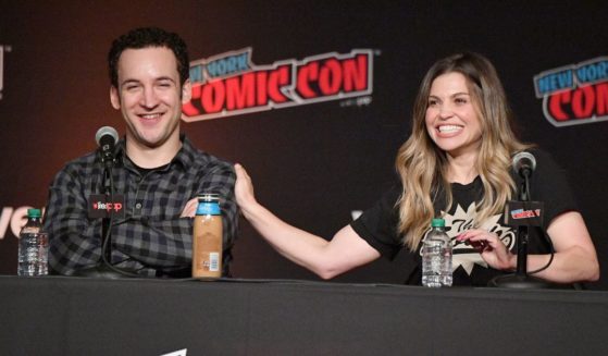 Ben Savage, left, and Danielle Fishel speak onstage at the Boy Meets World 25th Anniversary Reunion panel during New York Comic Con at Jacob K. Javits Convention Center on Oct. 5, 2018, in New York City.
