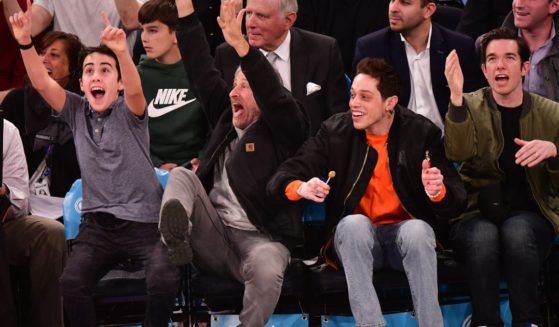 Nathan Stewart, Jon Stewart, Pete Davidson and John Mulaney attend Chicago Bulls v New York Knicks game at Madison Square Garden on April 1, 2019 in New York City.