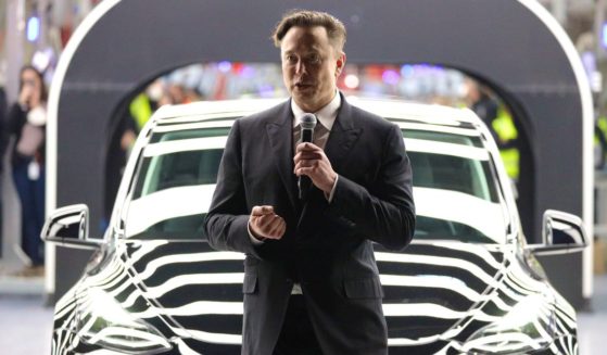 Tesla CEO Elon Musk speaks during the official opening of the new Tesla electric car manufacturing plant on March 22, 2022, near Gruenheide, Germany.