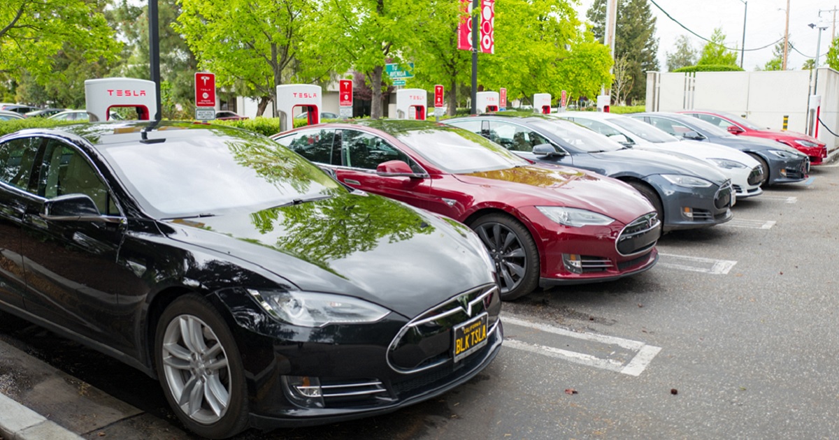 Tesla Motors sedans are seen charging at a Supercharger station in the Silicon Valley town of Mountain View, California, in April 2017.