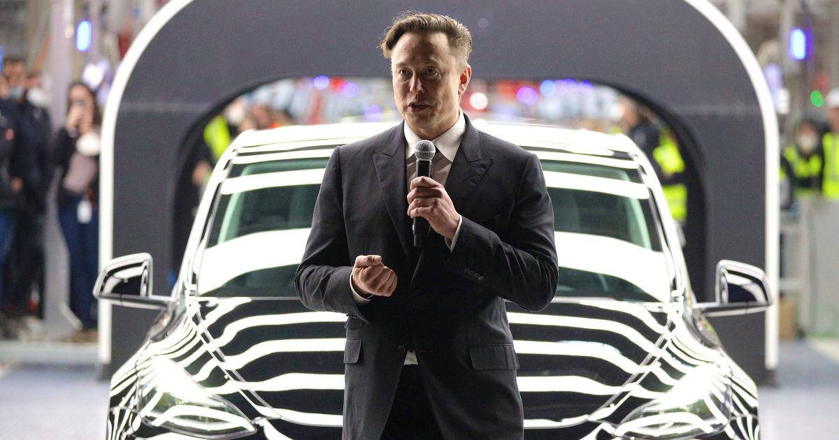 Tesla CEO Elon Musk speaks during the official opening of the new Tesla electric car manufacturing plant on March 22, 2022, near Gruenheide, Germany.