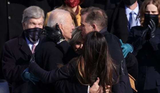 Joe Biden hugs his wife, Dr. Jill Biden, son Hunter Biden and daughter Ashley Biden after being sworn in as U.S. president during his inauguration on the West Front of the U.S. Capitol on January 20, 2021 in Washington, DC.