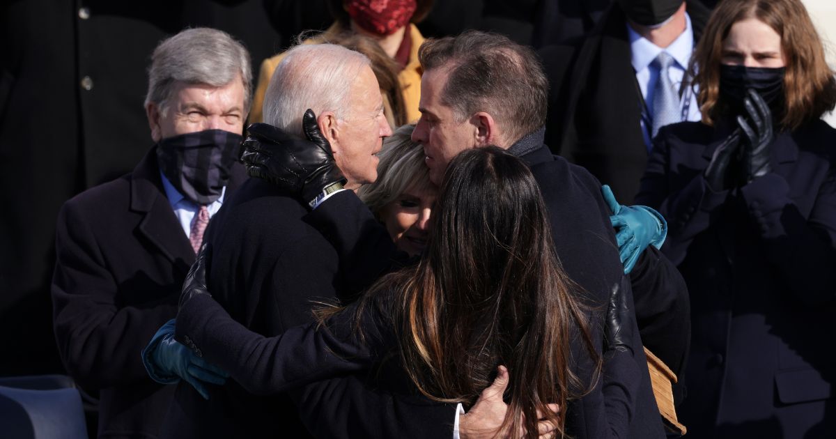 Joe Biden hugs his wife, Dr. Jill Biden, son Hunter Biden and daughter Ashley Biden after being sworn in as U.S. president during his inauguration on the West Front of the U.S. Capitol on January 20, 2021 in Washington, DC.