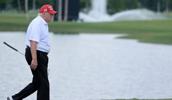 Former President Donald Trump walks the 18th hole during a pro-am prior to the LIV Golf Invitational - Miami at Trump National Doral Miami on Oct. 27, 2022, in Doral, Florida.