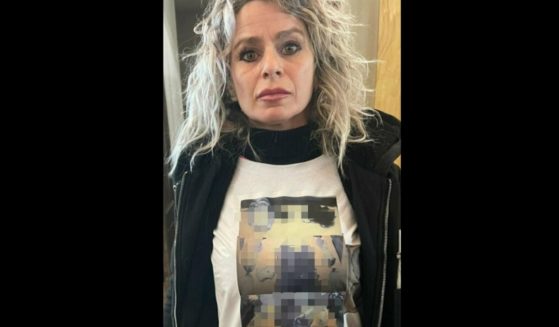 Alessandra Verni wears a shirt with images of her daughter's dismembered body to the court hearing of her daughter's killer in Italy, last week.