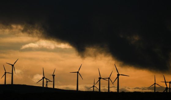 Wind turbines stand at an onshore wind farm in Llandinam, central Wales, on Monday.