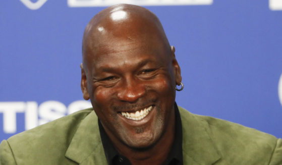 Michael Jordan speaking at a news conference