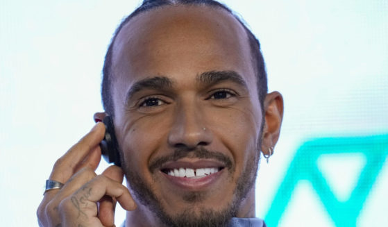 Lewis Hamilton of Britain listening to a question during a news conference