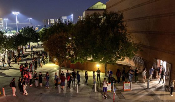 Voters line up to cast their ballots on the campus of Arizona State University in Tempe on Nov. 8, 2022.
