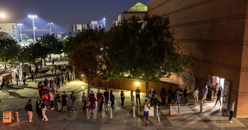 Voters line up to cast their ballots on the campus of Arizona State University in Tempe on Nov. 8, 2022.