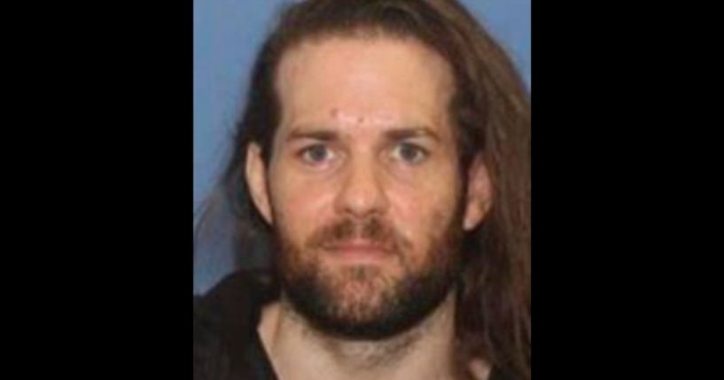 An undated photo provided by the Grants Pass, Oregon, Police Department shows Benjamin Obadiah Foster, a fugitive who police say took his own life Tuesday.