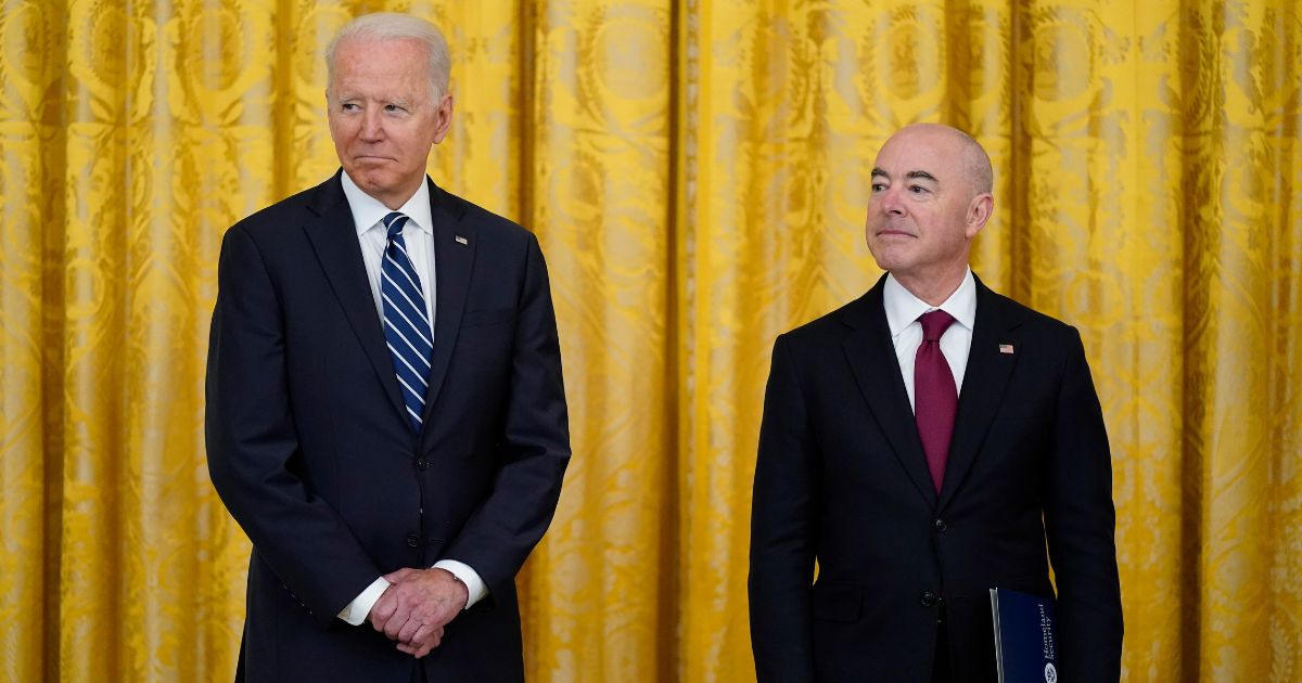 President Joe Biden and Secretary of Homeland Security Alejandro Mayorkas attend a naturalization ceremony in the East Room of the White House in Washington on July 2, 2021.