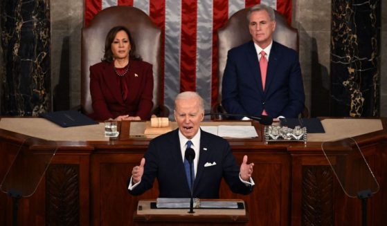 Vice President Kamala Harris and Speaker of the House Kevin McCarthy listen as President Joe Biden delivers the State of the Union address at the Capitol in Washington on Tuesday.