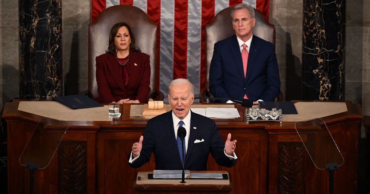 Vice President Kamala Harris and Speaker of the House Kevin McCarthy listen as President Joe Biden delivers the State of the Union address at the Capitol in Washington on Tuesday.