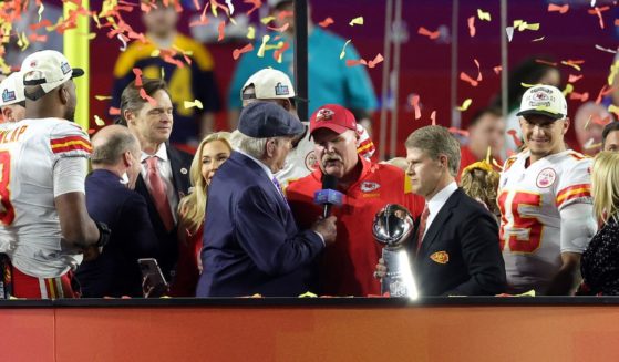 Terry Bradshaw interviews coach Andy Reid as the Kansas City Chiefs celebrate with the the Vince Lombardi Trophy after defeating the Philadelphia Eagles 38-35 in Super Bowl LVII at State Farm Stadium in Glendale, Arizona, on Sunday.