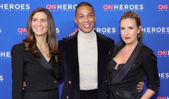 Kaitlan Collins, Don Lemon and Poppy Harlow attend an event at the American Museum of Natural History on Dec. 11, 2022, in New York City.